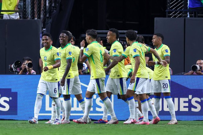 28 June 2024, US, Las Vegas: Brazil's Vinicius Junior (2nd L) celebrates scoring his side's first goal with team mates during the CONMEBOL Copa America 2024 Group D soccer match between Paraguay and Brazil at Allegiant Stadium. Photo: William Volcov/ZUMA 