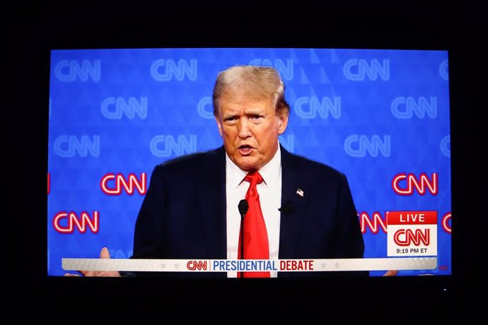 June 28, 2024, Atlanta, United States: This photo taken from a screen shows the first presidential debate between US President Joe Biden (not in the picture) and former President Donald Trump in the CNN studio in Atlanta. The first pre-election debate bet