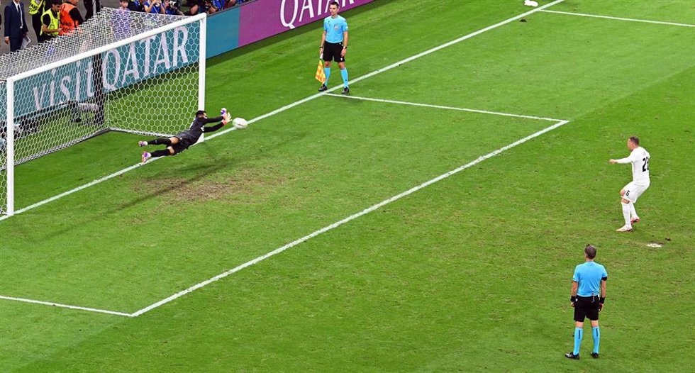 Portugal goalkeeper Diogo Costa (L) saves the penalty shot from Slovenia's Josip Ilicic (R) in the penalty shoot-out during the UEFA Euro 2024 round of 16 football match between Portugal and Slowenien at the Frankfurt Arena