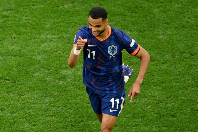 02 July 2024, Bavaria, Munich: Netherlands' Cody Gakpo celebrates scoring his side's first goal during the UEFA Euro 2024 round of 16 soccer match between Romania and The Netherlands at the Allianz Arena. Photo: Peter Kneffel/dpa