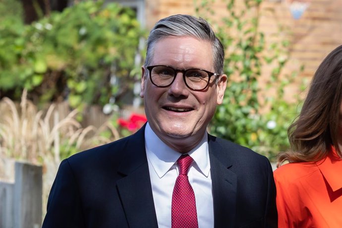 July 4, 2024, London, United Kingdom: Leader of the Labour Party Keir Starmer and his wife Victoria Starmer arrive at a polling station to cast their votes. Polls have opened across the UK as members of the public vote in the general election largely expe