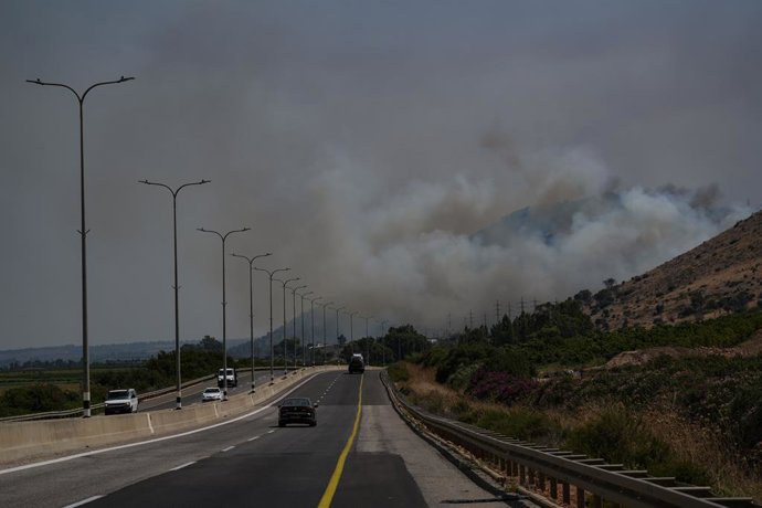 ISRAEL-LEBANON BORDER, July 4, 2024  -- Smoke billows from an area hit by rockets launched from southern Lebanon, in the northern Israeli border with Lebanon, on July 4, 2024. An Israeli army officer was killed in Hezbollah rocket fire on Thursday, the 