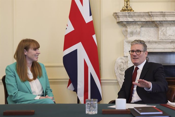 LONDON, July 6, 2024  -- Britain's new Prime Minister Keir Starmer (R) talks with Angela Rayner in 10 Downing Street in London, Britain, July 5, 2024. Keir Starmer, who has led the Labour Party to achieve a landslide victory in Britain's general election,