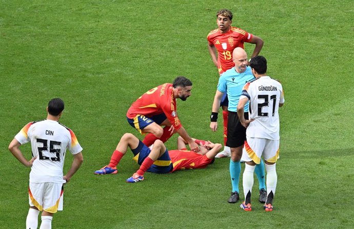 05 July 2024, Baden-Württemberg, Stuttgart: Spain's Pedri lies injured on the pitch during the UEFA EURO 2024 quarter-final soccer match between Spain and Germany at the MHPArena. Photo: Bernd Weibrod/dpa