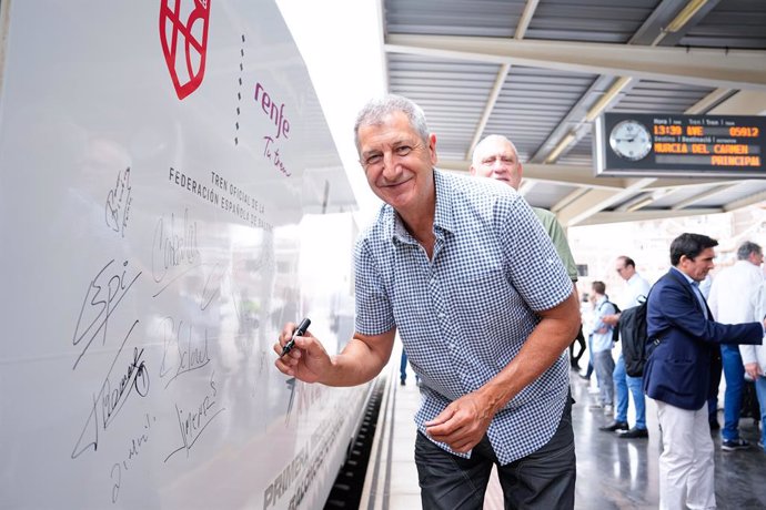 Andres Jimenez signs the train during a Renfe event that brings together the Spanish Olympic basketball team that won the silver medal at the 84 Los Angeles Olympics on June 28, 2024 in Madrid, Spain.