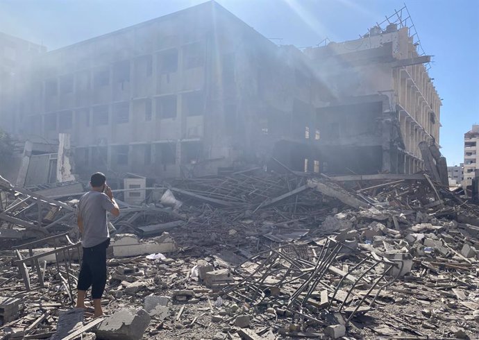 July 7, 2024, Gaza City, Gaza Strip, Palestinian Territory: Palestinians inspect the Holy Family School which shelters displaced people, after it was hit in an Israeli strike, amid Israel-Hamas conflict, in Gaza City, July 7, 2024