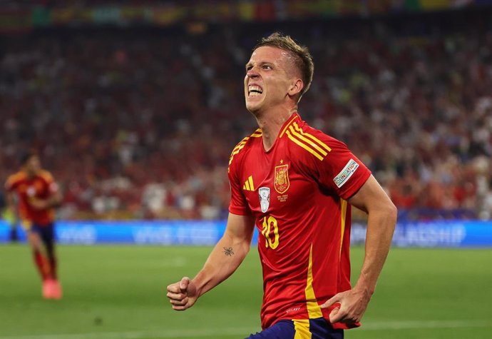 09 July 2024, Bavaria, Munich: Spain's Dani Olmo celebrates his side's second goal of the game during the UEFA Euro 2024 Semi-final soccer match between Spain and France at Munich Football Arena. Photo: Christian Charisius/dpa