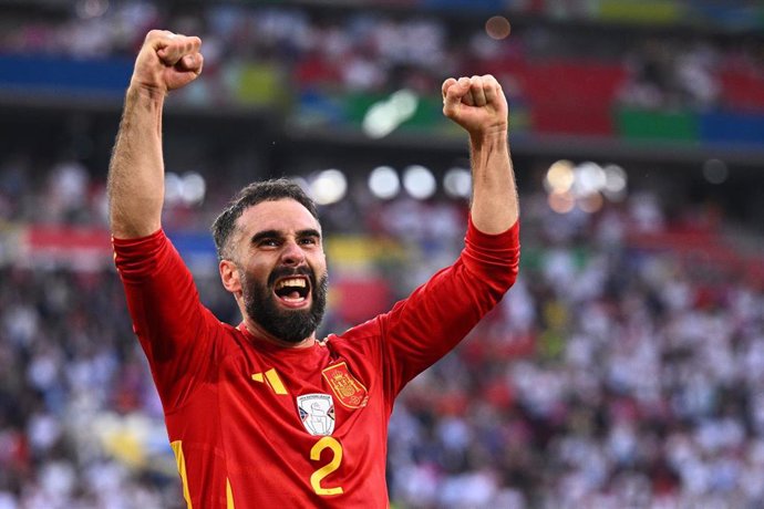 05 July 2024, Baden-Württemberg, Stuttgart: Spain's Dani Carvajal celebrates victory after the UEFA EURO 2024 quarter-final soccer match between Spain and Germany at the MHP Arena. Photo: Tom Weller/dpa