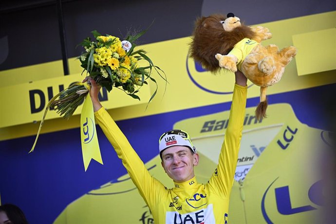 03 July 2024, France, Dijon: Slovenian Tadej Pogacar of UAE Team Emirates celebrates in the yellow jersey of leader in the overall ranking after stage 6 of the 2024 Tour de France cycling race, from Macon to Dijon (163,5 KM). Photo: Jasper Jacobs/Belga/dp