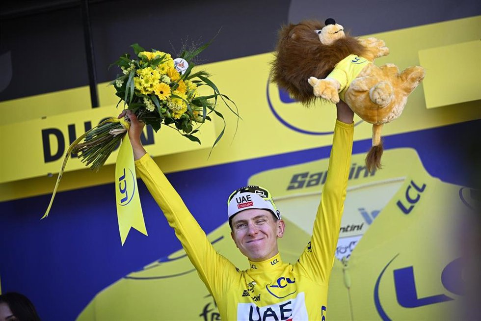03 July 2024, France, Dijon: Slovenian Tadej Pogacar of UAE Team Emirates celebrates in the yellow jersey of leader in the overall ranking after stage 6 of the 2024 Tour de France cycling race, from Macon to Dijon (163,5 KM). Photo: Jasper Jacobs/Belga/