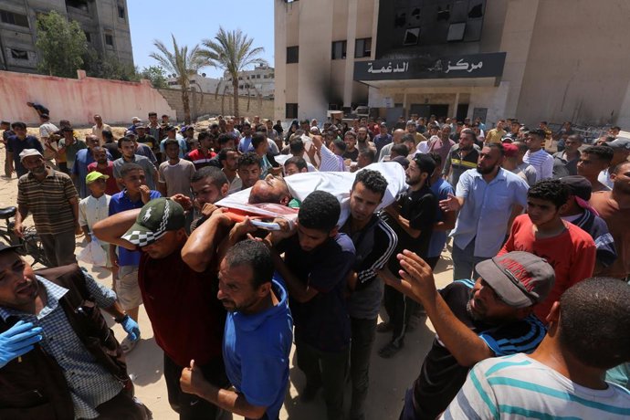 July 13, 2024, Khan Yunis, Gaza Strip, Palestinian Territory: Bodies of the Palestinians who lost their lives after Israeli attack hits displaced people's tents in Al-Mawasi area, are brought the hospital in Khan Yunis, Gaza on July 13, 2024. Over 70 Pa