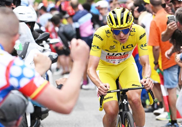 13 July 2024, France, Saint-Lary-Soulan Pla D'adet: Slovenian Tadej Pogacar of UAE Team Emirates on his way to win stage 14 of the 2024 Tour de France cycling race, from Pau to Saint-Lary-Soulan Pla d'Adet. Photo: Pool Bernard Papon/Belga/dpa