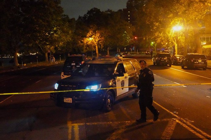 June 19, 2024, Oakland, California, United States: Police officers investigate at the crime scene after multiple people had been shot. On the evening of June 19, a shooting incident is reported by the California Highway Patrol and the Oakland Police Depar