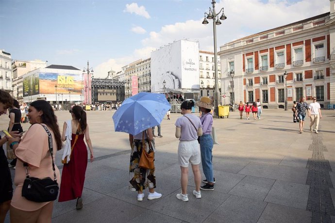 Varias personas en el centro de la ciudad