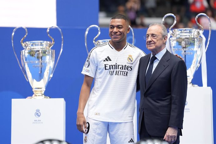 Kylian Mbappe and Florentino Perez Rodriguez, President of Real Madrid during his presentation as new player of Real Madrid at Santiago Bernabeu stadium on July 16, 2024 in Madrid, Spain.