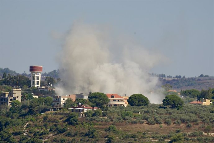 TAYR HARFA, July 13, 2024  -- Smoke caused by an Israeli strike is seen in Tayr Harfa, southern Lebanon, on July 12, 2024. A Hezbollah member was killed and two civilians injured on Friday in Israeli airstrikes and artillery shelling targeting several bor