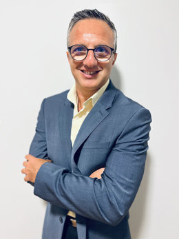 The given image represents MainStreamings newly appointed Chief Customer Officer, Nicola Micali, in blue jacket and yellow shirt.