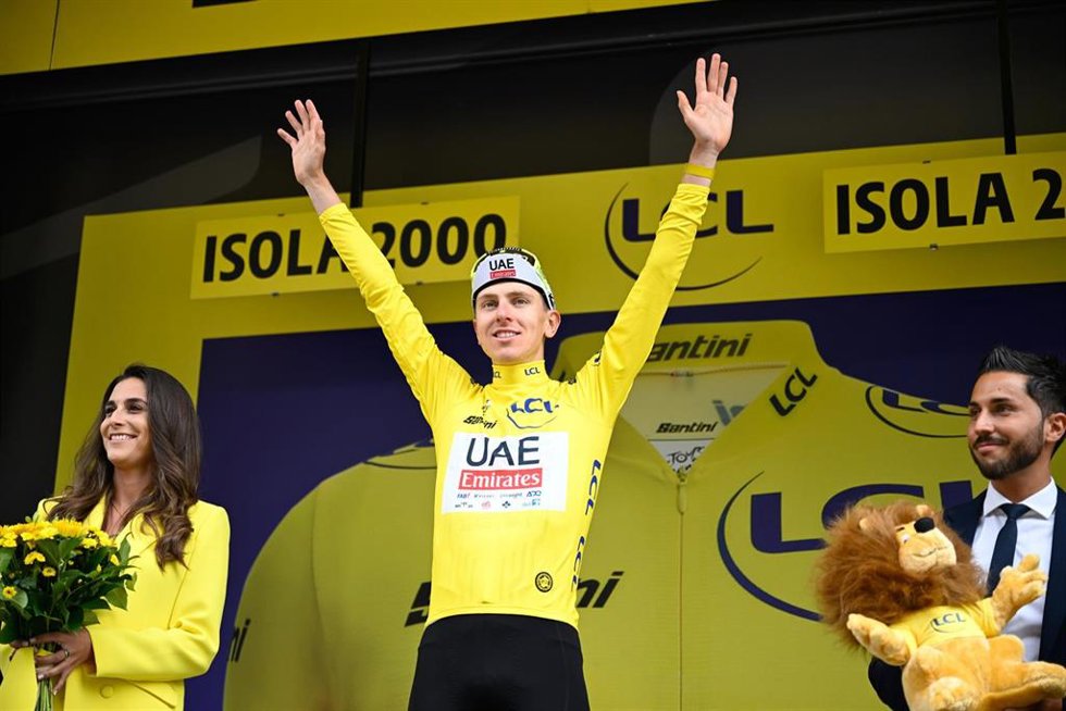 19 July 2024, France, Isola 2000: Slovenian cyclist Tadej Pogacar of UAE Team Emirates celebrates on the podium after winning the 19th stage of the 111th edition of the Tour de France cycling race, 144,6 km between Embrun and Isola 2000. Photo: Tom Goyv