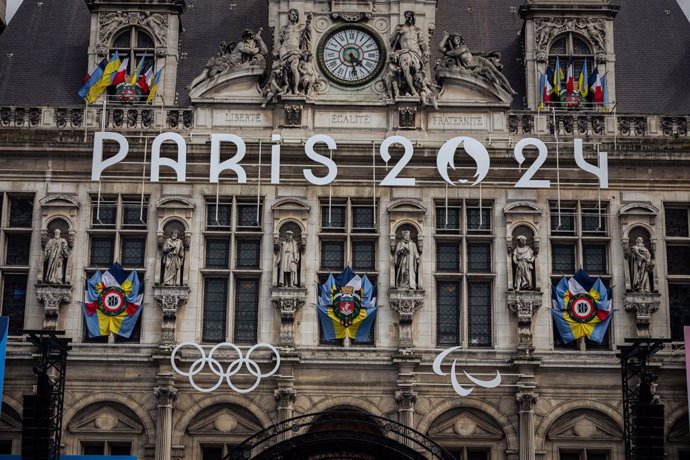 July 23, 2024, Paris, France: The facade of the Paris City Hall building is decorated for the Paris Olympic and Paralympic Games. Just a few days before the unprecedented inauguration of the Paris Olympic Games, which will take place along 6 kilometres of