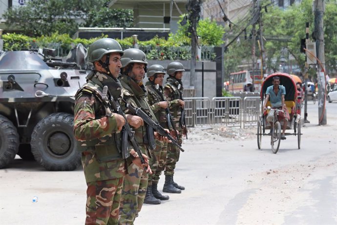 July 27, 2024, Dhaka, Wari, Bangladesh: Bangladesh army stand guard near the country's Secretariat as the curfew is relaxed after the anti-quota protests, in Dhaka on July 28, 2024. Bangladesh said three student leaders had been taken into custody for the