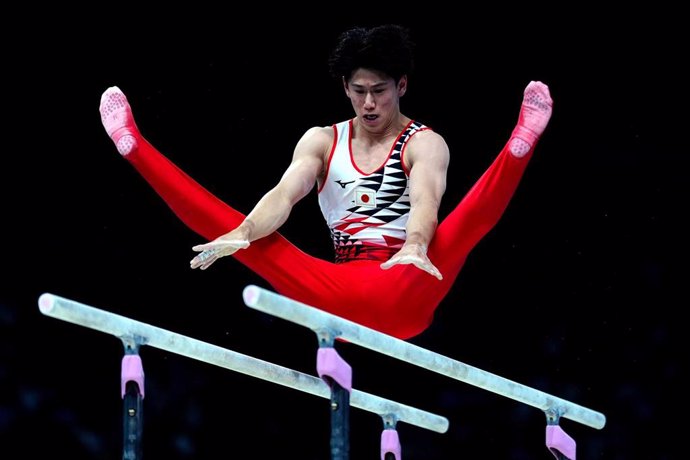 27 July 2024, France, Paris: Japan's Daiki Hashimoto performs on the Parallel Bars during the Artistic Gymnastics, Men's Qualification at the Bercy Arena on the first day of the 2024 Paris Olympic Games. Photo: Peter Byrne/PA Wire/dpa