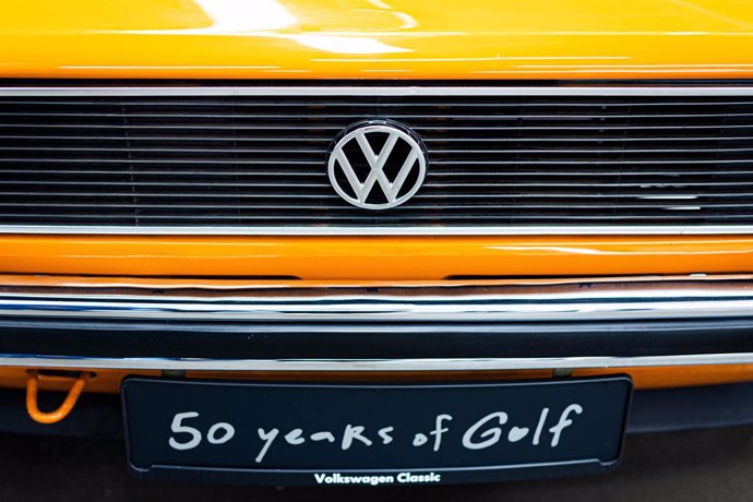 Archivo - 03 June 2024, Lower Saxony, Wolfsburg: A Volkswagen Golf decorated with the words "50 years of Golf" stands at the "50 years of Golf production" ceremony at the VW plant. 