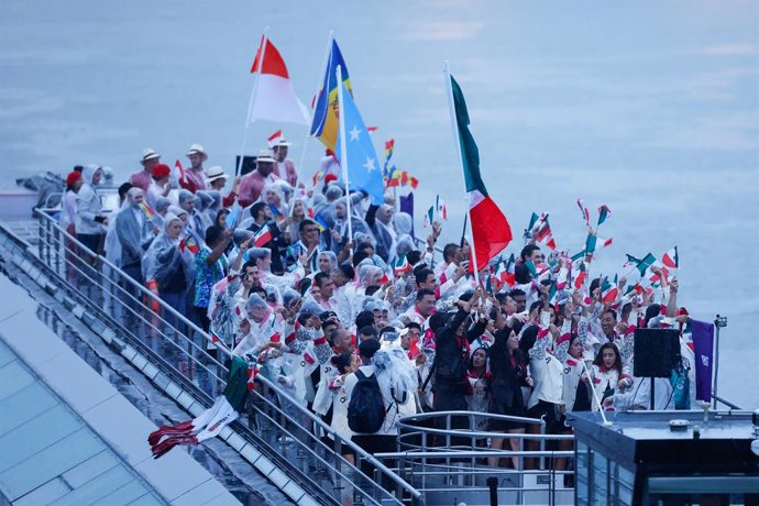 Delegations of Mexico, Federated States of Micronesia, Moldova and Monaco on a boat on the Seine River during the opening ceremony at the Seine River of the Paris 2024 Olympics Games on july 26, 2024, in Paris, Spain.