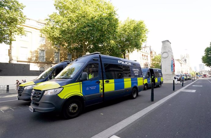 31 July 2024, United Kingdom, London: Territorial Support Group police vans parked in Whitehall, ahead of the 'Enough is Enough' protest, following the fatal stabbing of three children at a Taylor Swift-themed holiday club on Monday in Southport. Photo: J