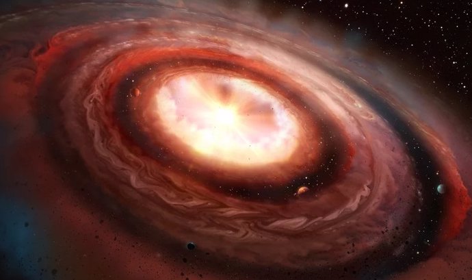 Ilustración de un modelo que muestra cómo gigantes gaseosos como Júpiter, Saturno o Urano podrían formarse rápidamente en el sistema solar a partir del polvo de un disco protoplanetario y luego impulsar el polvo hacia áreas fuera de su órbita.