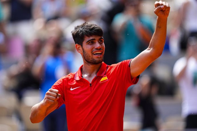 Carlos Alcaraz of Spain celebrates the victory against Tommy Paul of United States during Men's Singles Quarter-Final Tennis match that gives him a place in the semi-finals on Roland-Garros - Court Philippe-Chatrier during the Paris 2024 Olympics Games on