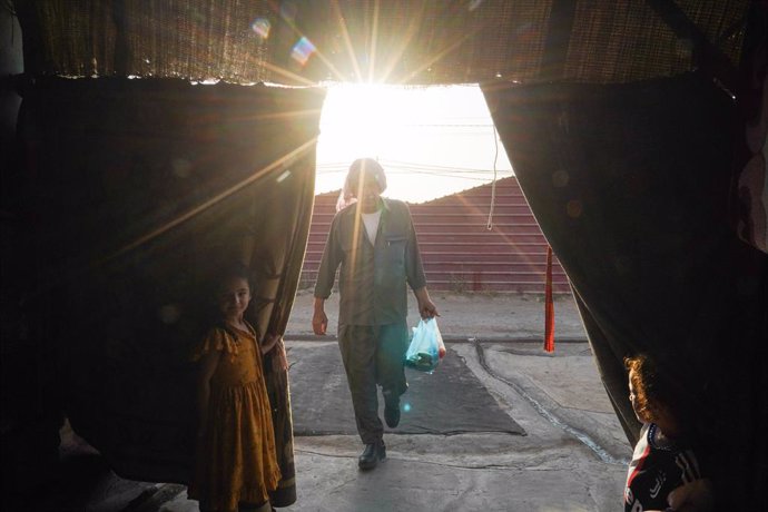 July 31, 2024, Dohuk, Iraq: Iraqi Yazidi displaced man walks into a tent in Sharya camp, Yazidi internally displaced persons (IDPs) some 15 kilometers from the northern city of Dohuk in the Kurdistan Region of Iraq. August 3 marks the 10th anniversary of 