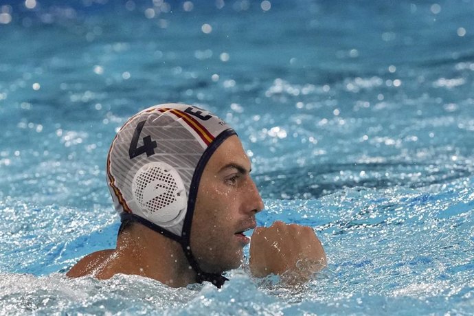 Spain's Bernat Sanahuja celebrates after scoring a goal during a men's water polo Group B preliminary match between Spain and Hungary at the 2024 Summer Olympics, Tuesday, July 30, 2024, in Saint-Denis, France. (AP Photo/Luca Bruno)