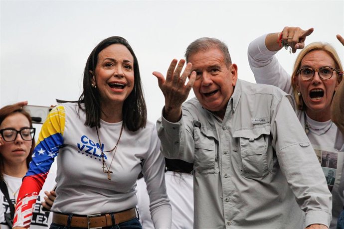 CARACAS, July 27, 2024  -- Maria Corina Machado (L, front), leader of the opposition Unitary Platform, and the opposition's presidential candidate Edmundo Gonzalez (R, front) react during a closing election campaign rally in Caracas, Venezuela, July 25,