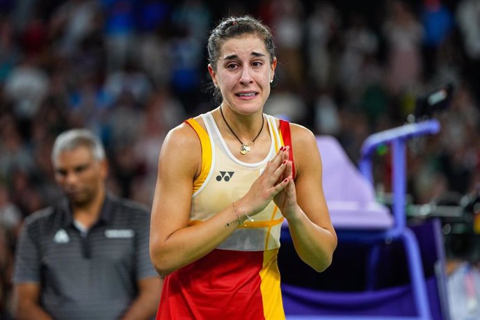 Carolina Marin of Spain is injured in the second set and leaves the match against Bing Jiao He of China during Women's Singles Semifinal of the Badminton on La Chapelle Arena Court 1 during the Paris 2024 Olympics Games on August 4, 2024 in Paris, France.