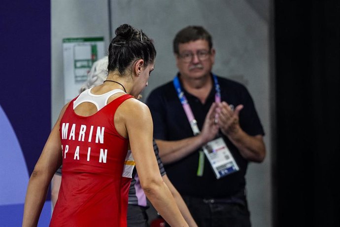 Carolina Marin of Spain is injured in the second set and leaves the match against Bing Jiao He of China during Women's Singles Semifinal of the Badminton on La Chapelle Arena Court 1 during the Paris 2024 Olympics Games on August 4, 2024 in Paris, France.