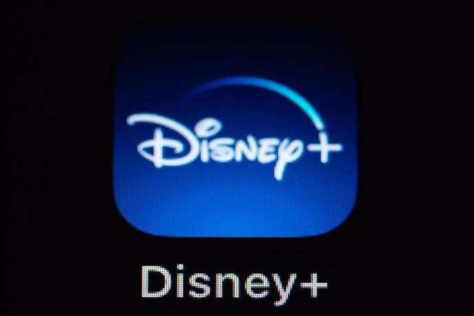 Archivo - FILED - 08 March 2022, Baden-Wuerttemberg, Rottweil: The application App Disney+ can be seen on the display of an iPhone SE. Photo: Silas Stein/dpa