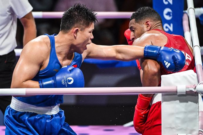 REYES PLA Enmanuel of Spain and HAN Xuezhen of China during the Boxing, MEN'S 92KG - PRELIMINARIES, Olympic Games Paris 2024 on 28 July 2024 at North Paris Arena in Villepinte, France - Photo Matthieu Mirville / DPPI Media / Panoramic