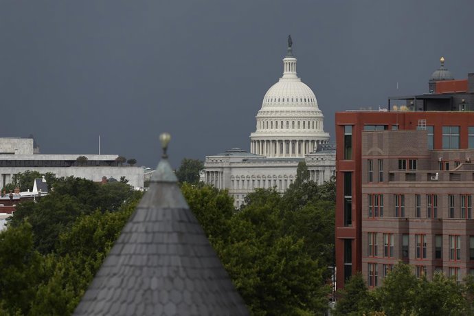 August 3, 2024, Washington, D.C, USA: A summer thunderstorm moves into Washington, D.C. with the The U.S. Capitol building at right.