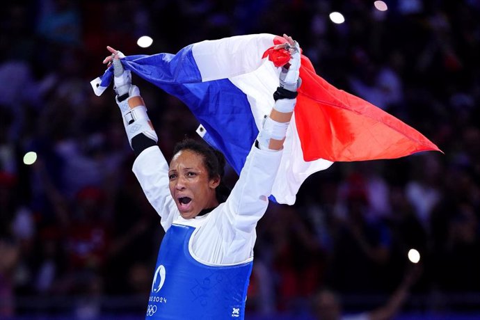 10 August 2024, France, Paris: France's Althea Laurin celebrates victory over Uzbekistan's Svetlana Osipova in the Women's +67kg gold medal contest at the Grand Palais on the fifteenth day of the 2024 Paris Olympic Games. Photo: Peter Byrne/PA Wire/dpa