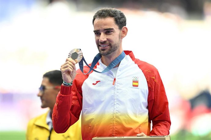 02 August 2024, France, Saint-Denis: Bronze Medallist Spain's Alvaro Martin celebrates after competing in the men's 20km race walk of the athletics event, during the Paris 2024 Olympic Games at Stade de France. Photo: Sven Hoppe/dpa