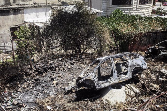 Un coche quemado en Nablús, Cisjordania