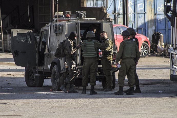 August 28, 2024, Jenin, West Bank, Palestine: An Israeli infantry force is seen in the center of the Far'a refugee camp during a large-scale Israeli raid.