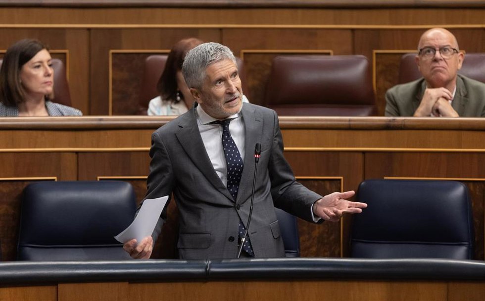 Archivo - El ministro de Interior, Fernando Grande-Marlaska, interviene durante una sesión de control al Gobierno, en el Congreso de los Diputados.