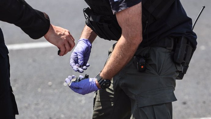 JERUSALEM, Aug. 6, 2024  -- Israeli police work at the scene of a drone attack in northern Israeli city of Nahariya on Aug. 6, 2024. A drone attack launched on Tuesday from Lebanon by Hezbollah forces injured six people in northern Israel, including one w