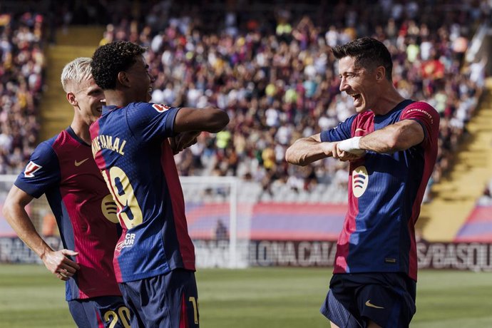 Robert Lewandowskin Dani Olmo and Lamine Yamal of FC Barcelona celebrates a goal during the Spanish league, La Liga EA Sports, football match played between FC Barcelona and Real Valladolid at Estadio Olimpico de Montjuic on August 31, 2024 in Barcelona, 