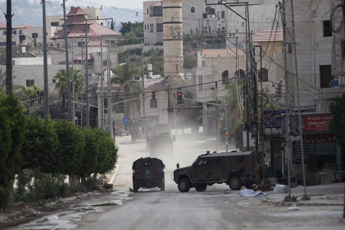 September 3, 2024, Tulkarem, West Bank, Palestinian Territory: Israeli armoured vehicles including a bulldozer drive on a street during a raid in Tulkarem on September 3, 2024, amid a large-scale military offensive launched a week earlier in the occupied 