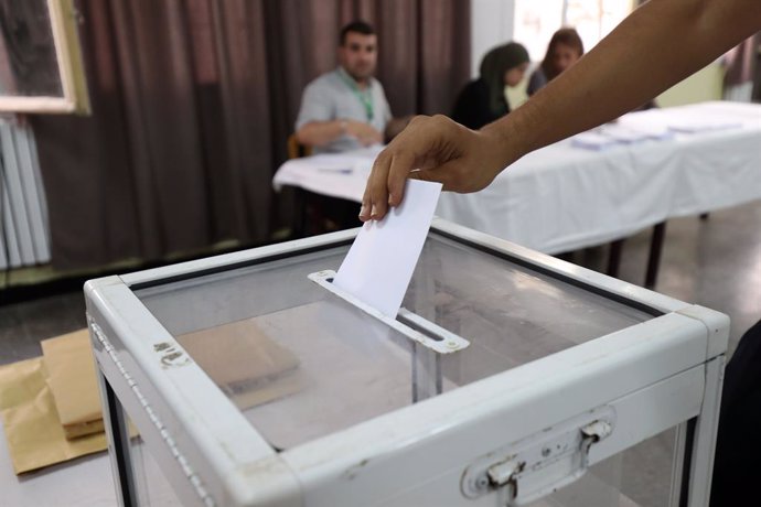 ALGIERS, Sept. 7, 2024  -- A voter casts a ballot at a polling station in Algiers, Algeria, on Sept. 7, 2024. Algerians headed to polls on Saturday to elect their next president, with more than 23 million citizens in the country eligible to cast their bal