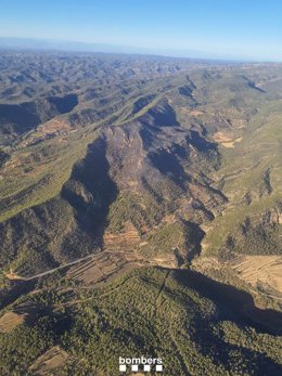 Vista aérea de la zona afectada por el fuego en Cabacés (Tarragona), en una imagen a última hora del viernes 13 de septiembre de 2024