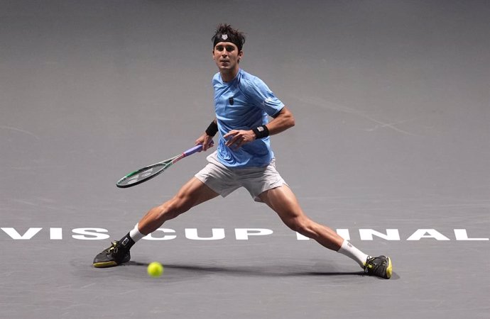 13 September 2024, United Kingdom, Manchester: Argentina's Tomas Martin Etcheverry in action during the Davis Cup group stage finals tennis match at the AO Arena. Photo: Martin Rickett/PA Wire/dpa