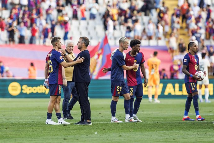 Hansi Flick, head coach speak with Fermin Lopez of FC Barcelona during the Spanish league, La Liga EA Sports, football match played between FC Barcelona and Real Valladolid at Estadio Olimpico de Montjuic on August 31, 2024 in Barcelona, Spain.